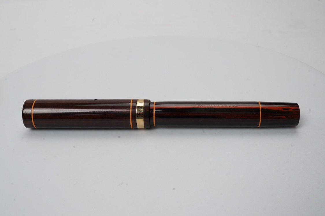 A Conklin Endura woodgrain lever filler fountain pen in near mint condition